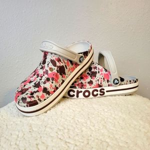 Like new! Pink and purple paint splatter CROCS